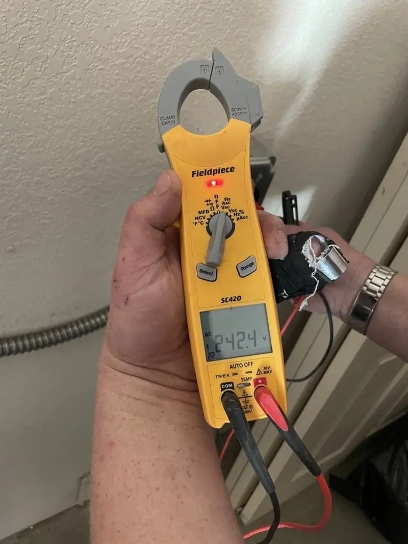 Voltage testing with clamp meter during Hot Tub / Pool Electrical Wiring in La Junta